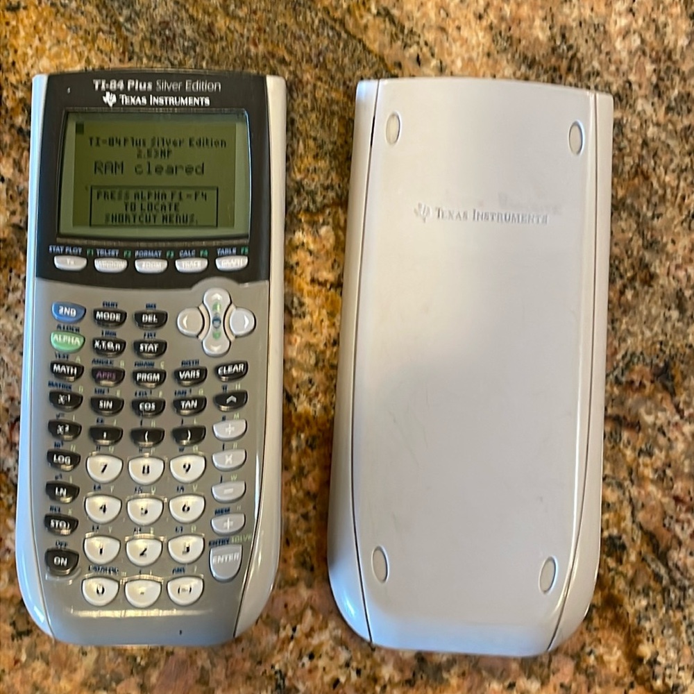 Texas instruments TI -84 Plus Silver Edition Graphing Calculator With Cover